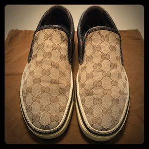 Gucci men’s signature monogram slip on shoes